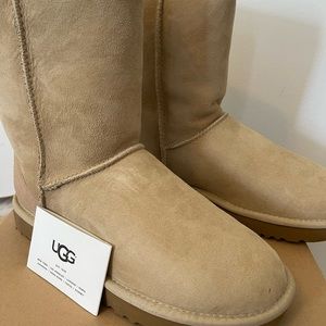 New in a box  Tan UGG boots size 7. Fits 7 1/2 women also